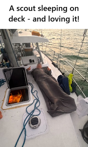 A scout sleepingg - happily - on deck