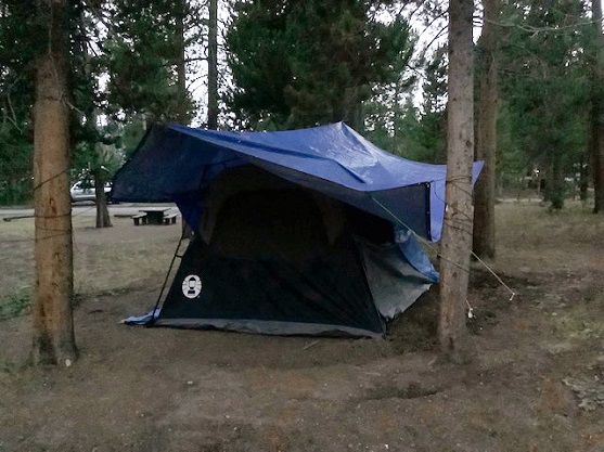 Tarp suspended obe the tent